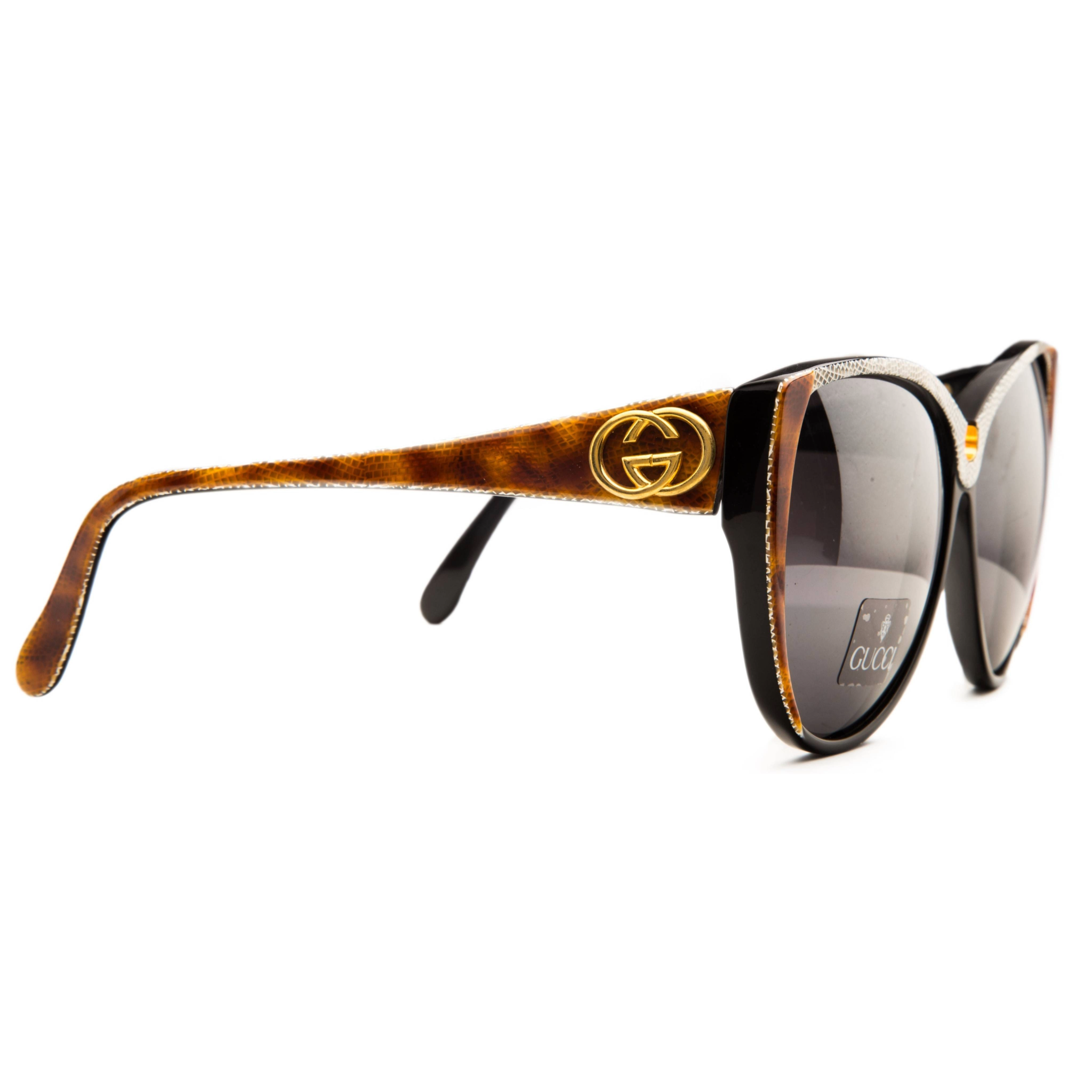 Authentic vintage Gucci Cat Eye 2108546 sunglasses for women in red marble frame and black smoke lens
