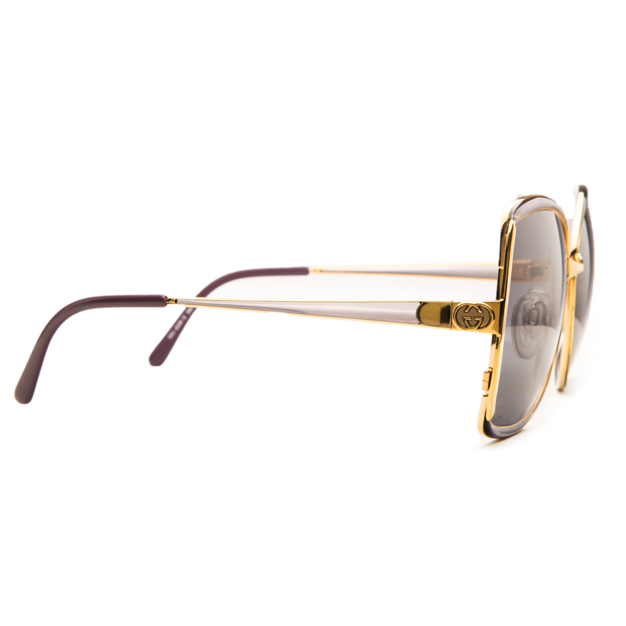 Black Gucci Square 22285 sunglasses with gold accents and brown lenses