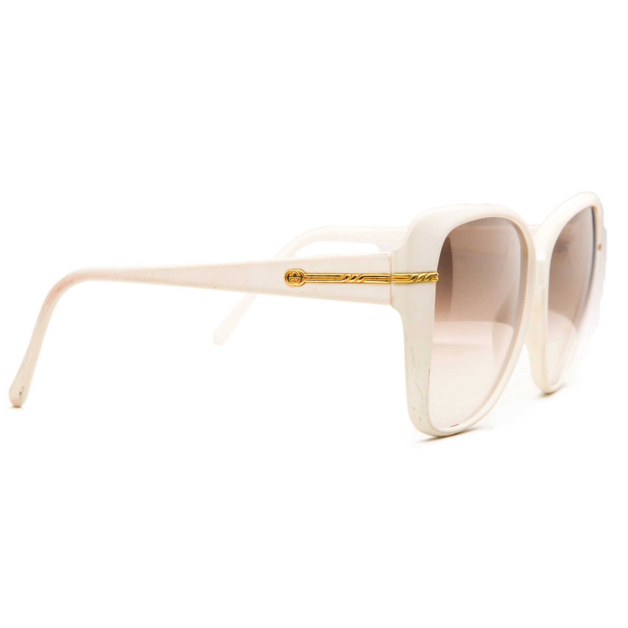 Stylish Vintage Gucci Square 4221 sunglasses for women with white frame and brown gradient lens, offering 100% UV protection, never before worn or sold, guaranteed authentic