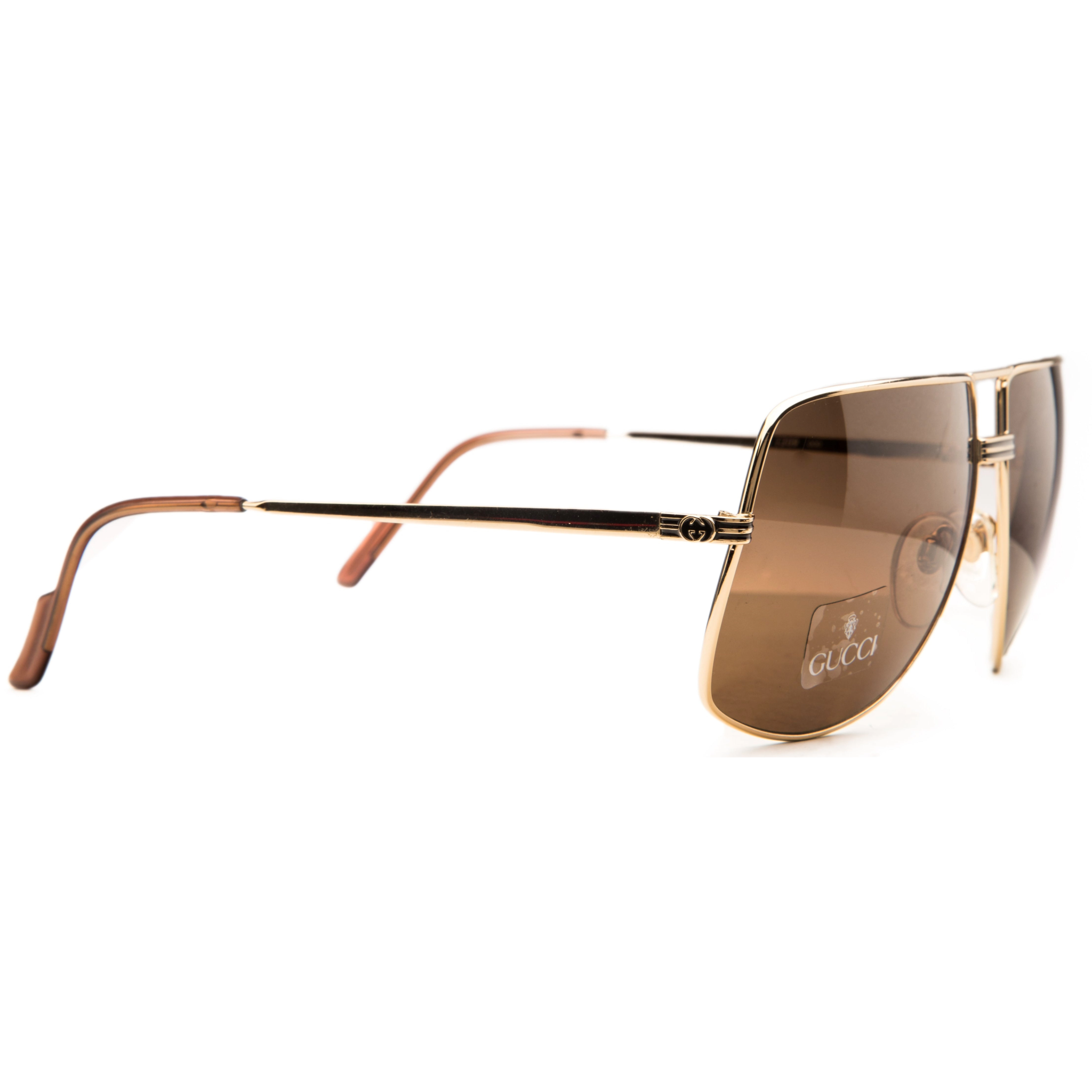 Authentic vintage Gucci Navigator 1209 sunglasses in gold frame