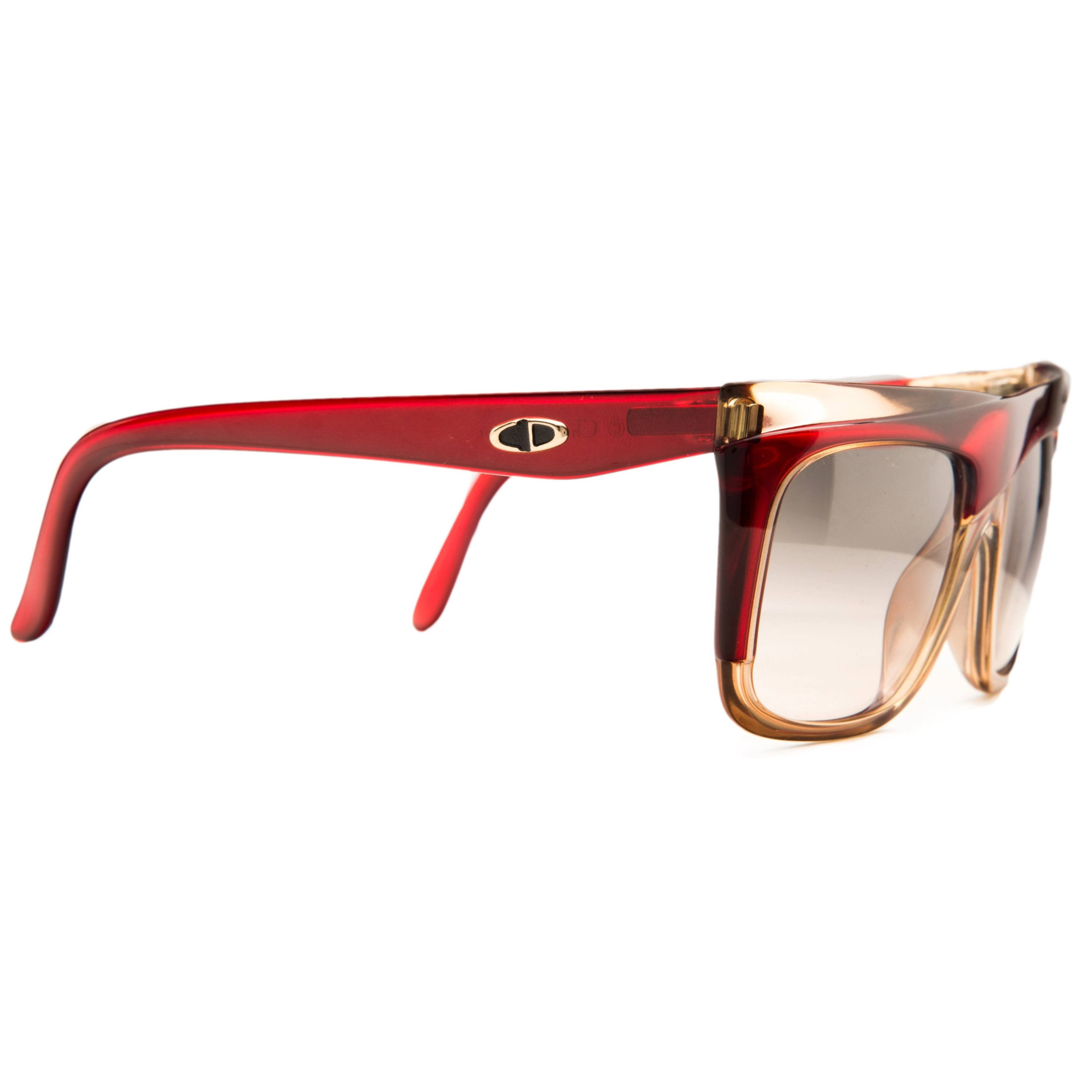 Authentic vintage Christian Dior 240030 sunglasses, suitable for both men and women, featuring a stylish crystal and red frame and black lenses with 100% UV protection, in pristine condition, never before worn or sold