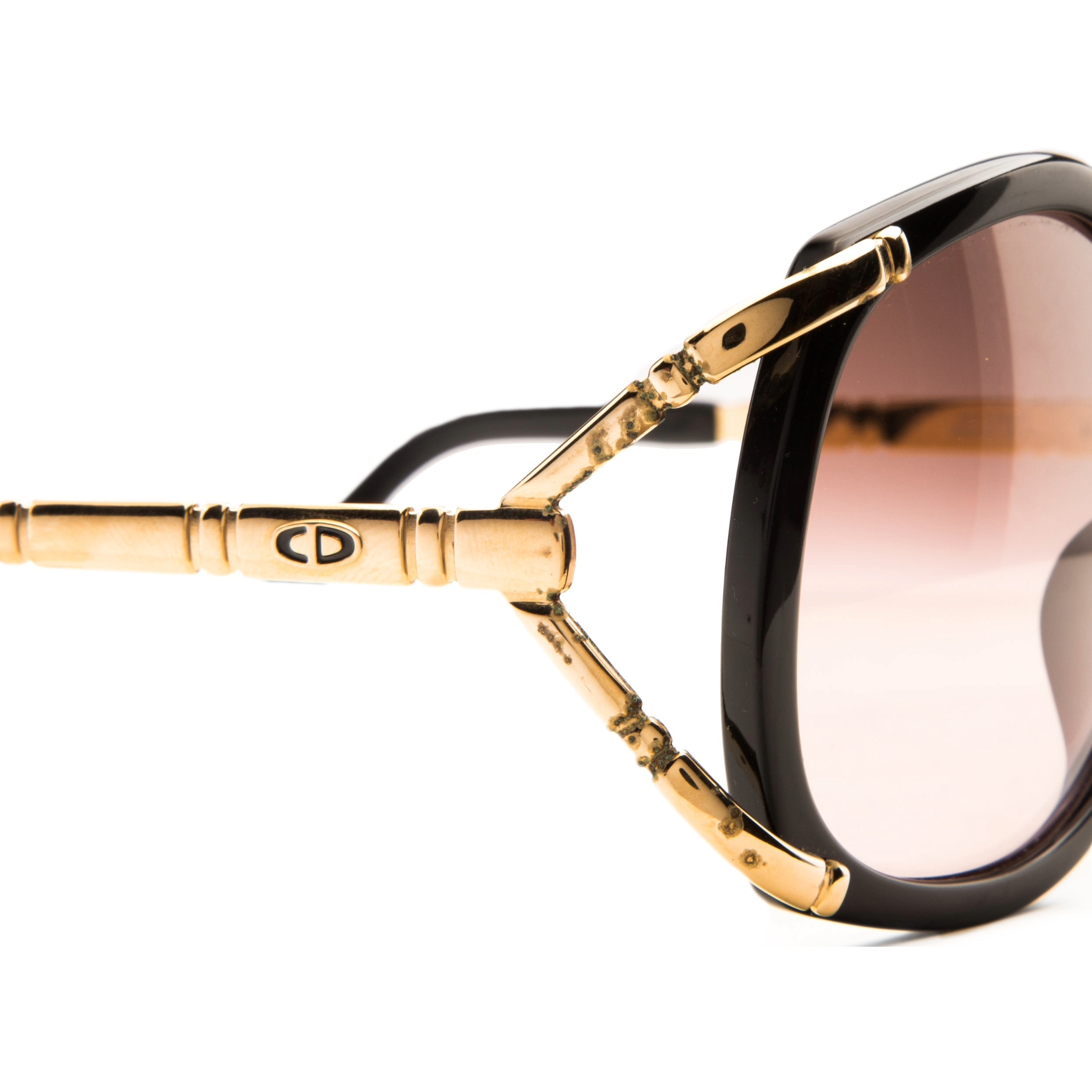 Original vintage Christian Dior Round 260590 sunglasses for women with 100% UV protection and some age-related marks on the metal