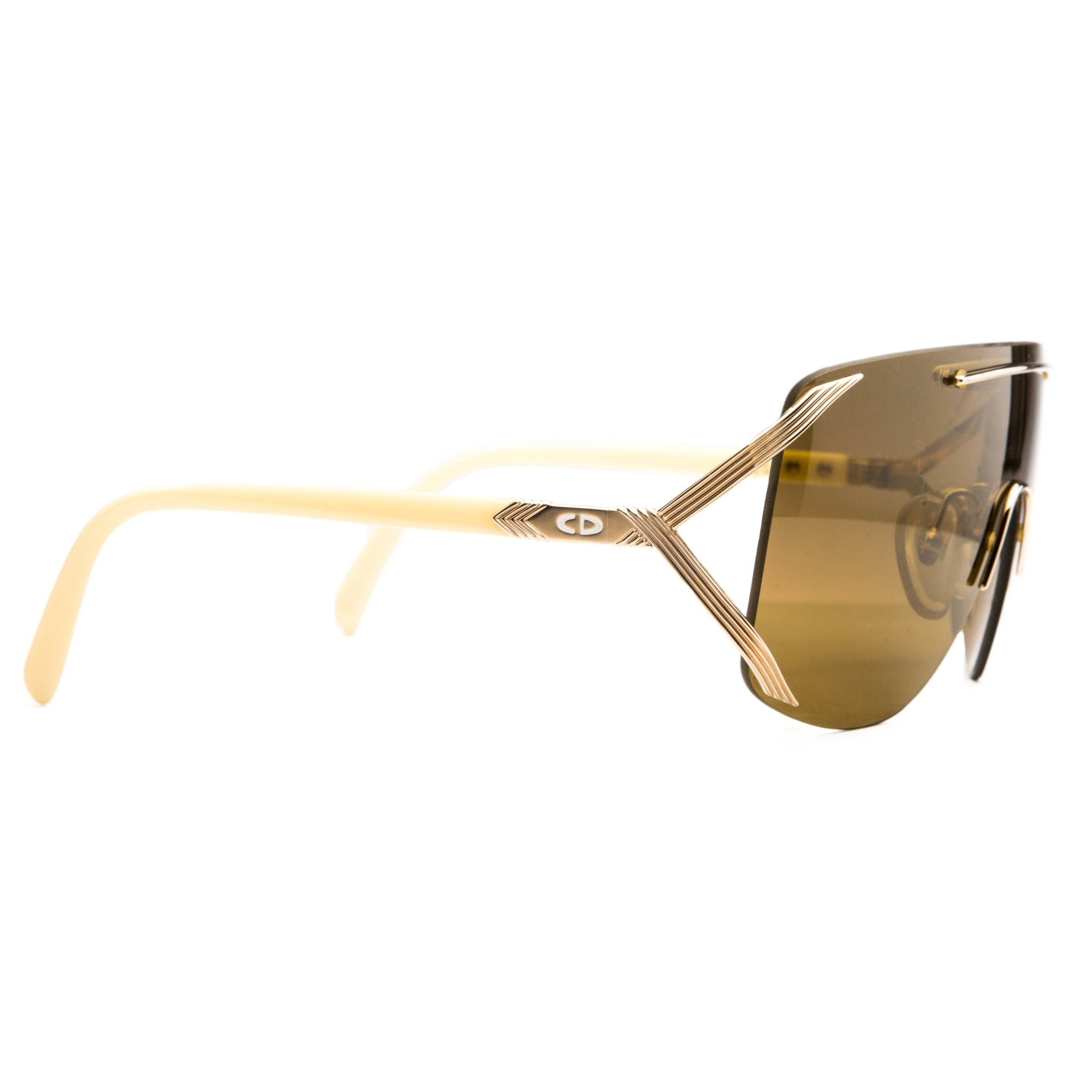 Unworn and authentic Vintage Christian Dior Visor 243475 sunglasses with brown frame and lenses