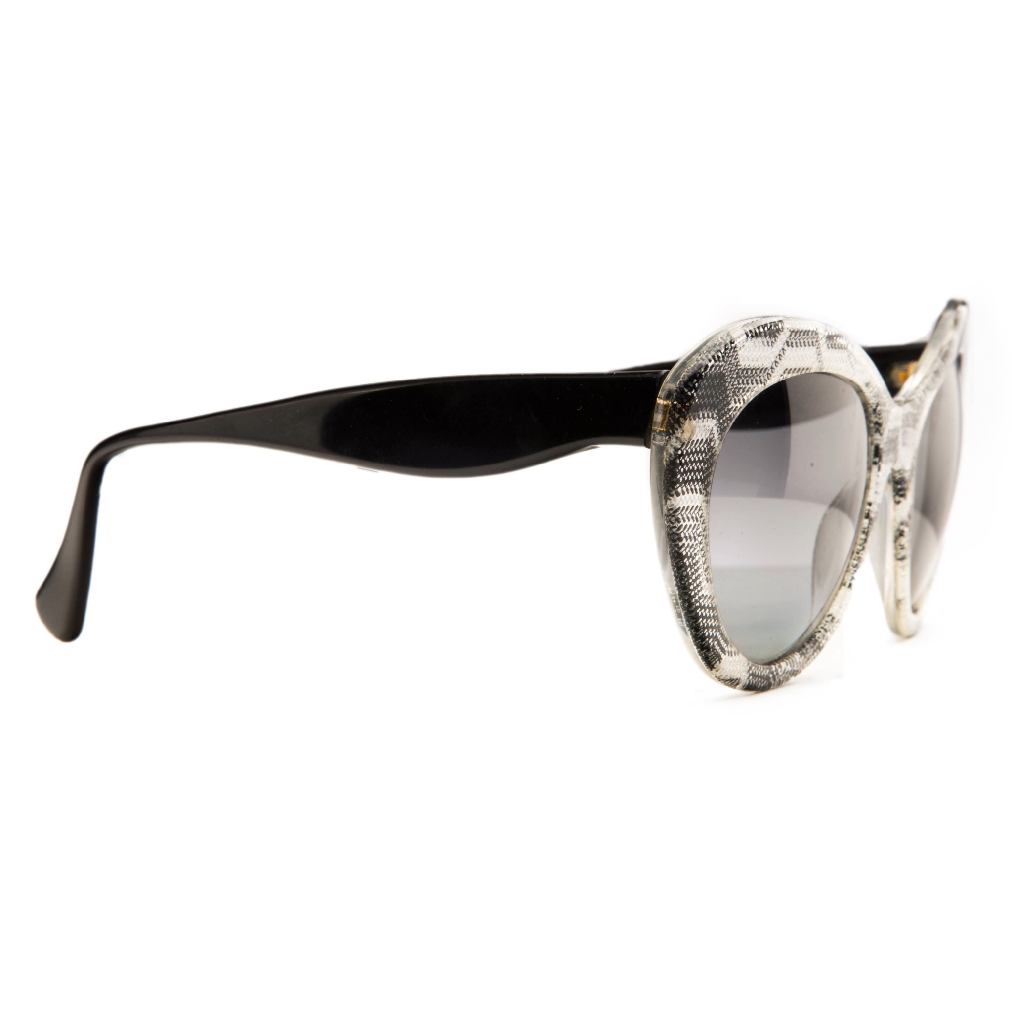 Black and gold Missoni Cat Eye 192 sunglasses with decorative pattern