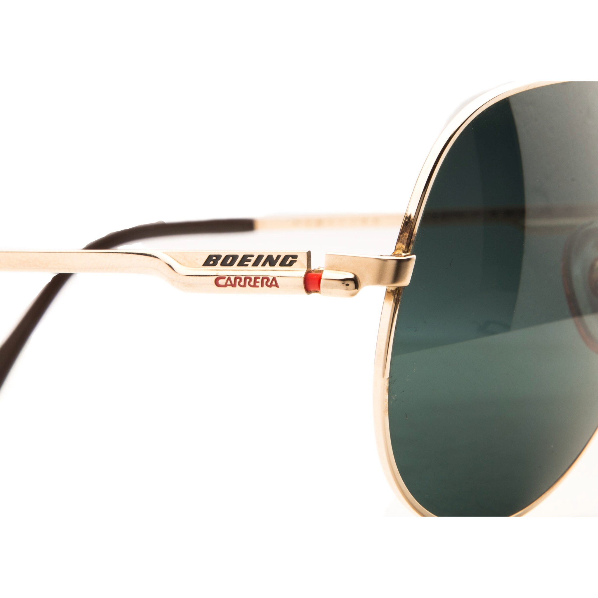Never before worn or sold, these vintage Boeing Aviator 5701 sunglasses in gold frame and green lens provide 100% UV protection for men and women