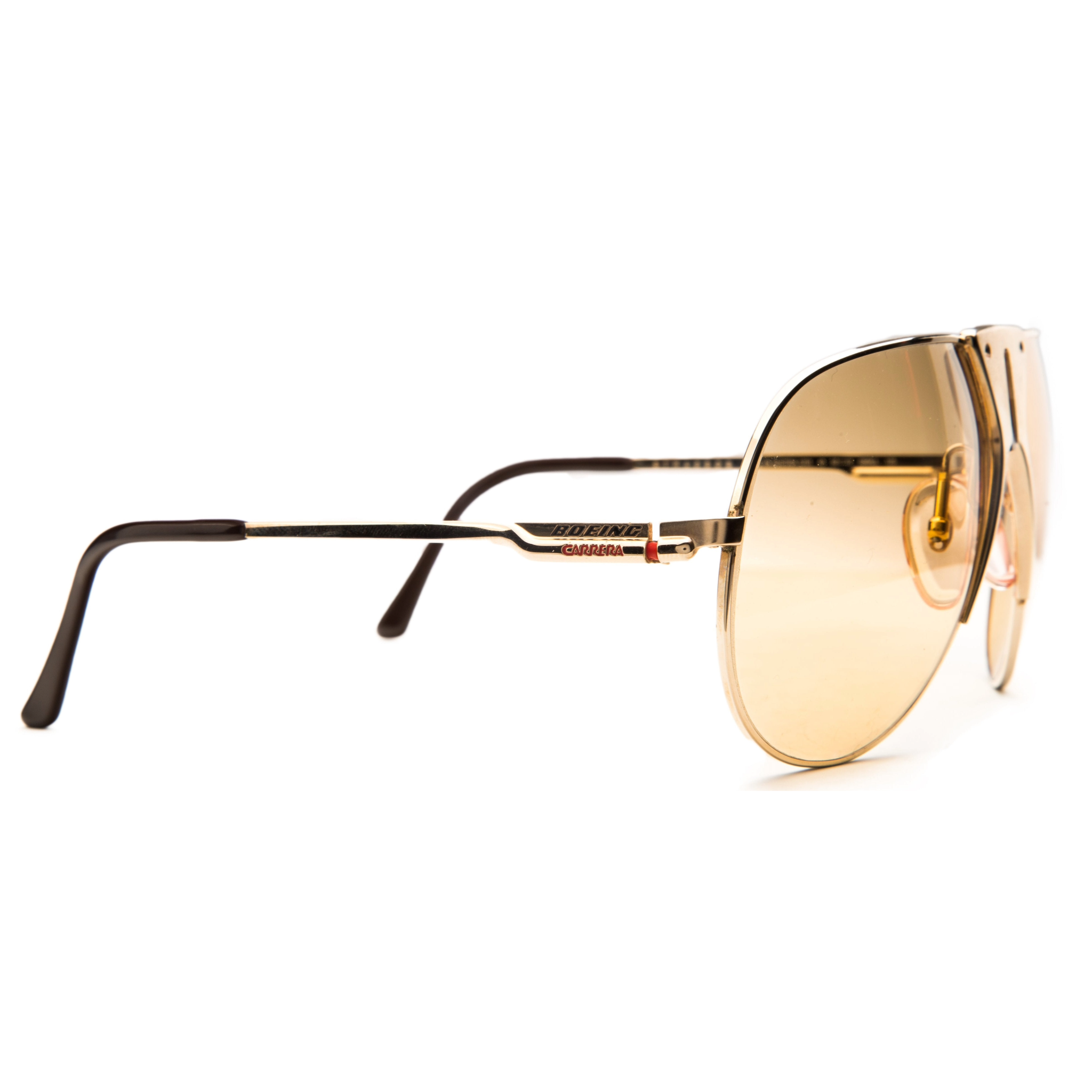 Authentic vintage Boeing Aviator 5701 sunglasses for men and women, featuring a gold frame and yellow lenses, in excellent condition and never before worn or sold