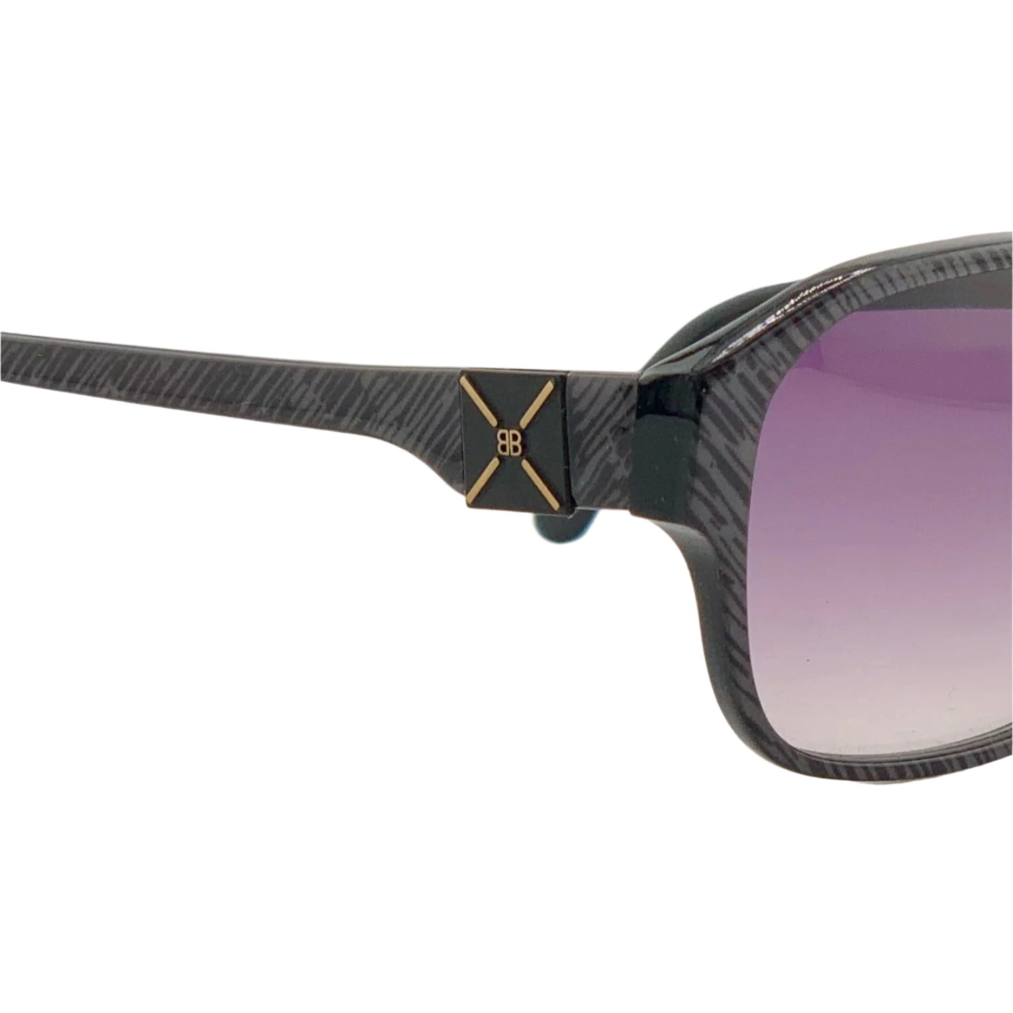 Black Balenciaga Round 2454 sunglasses with gold accents and oversized round frames
