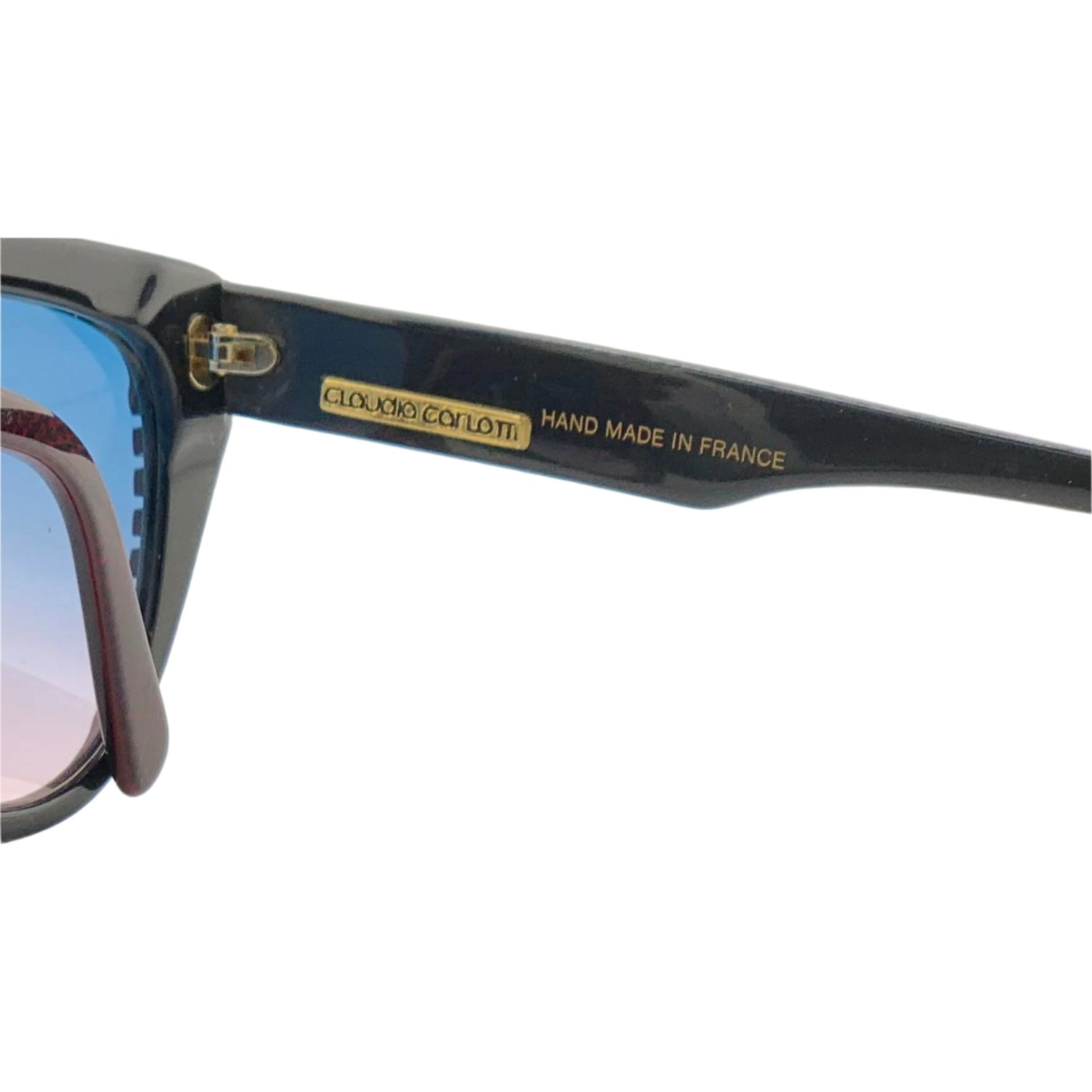 Side view of vintage red and gold Claudia Carlotti cat eye sunglasses, with blue and pink gradient lenses, hand made in France and in superb condition, never before worn or sold