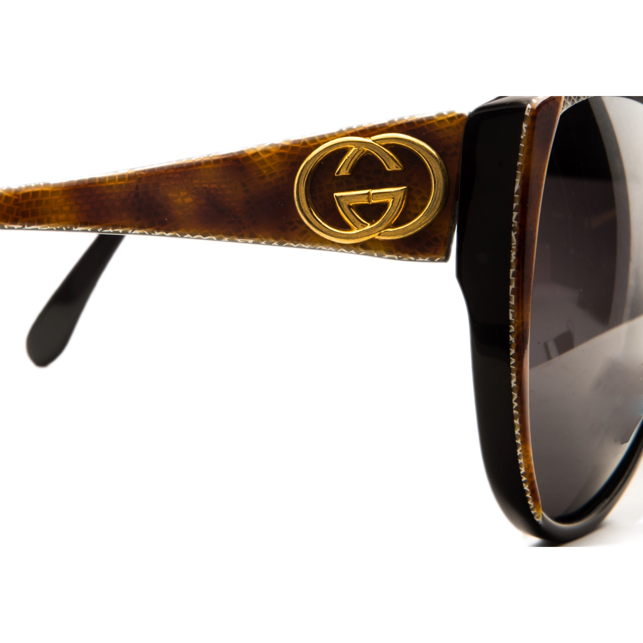  Vintage Gucci Cat Eye 2108546 sunglasses with red marble frame, black smoke lens, and 100% UV protection for women