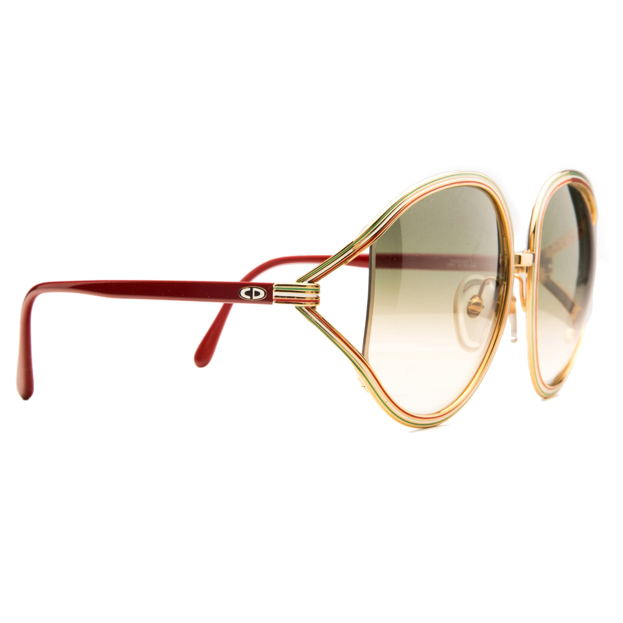 Christian Dior Round 247543 sunglasses with gold frames and brown lenses