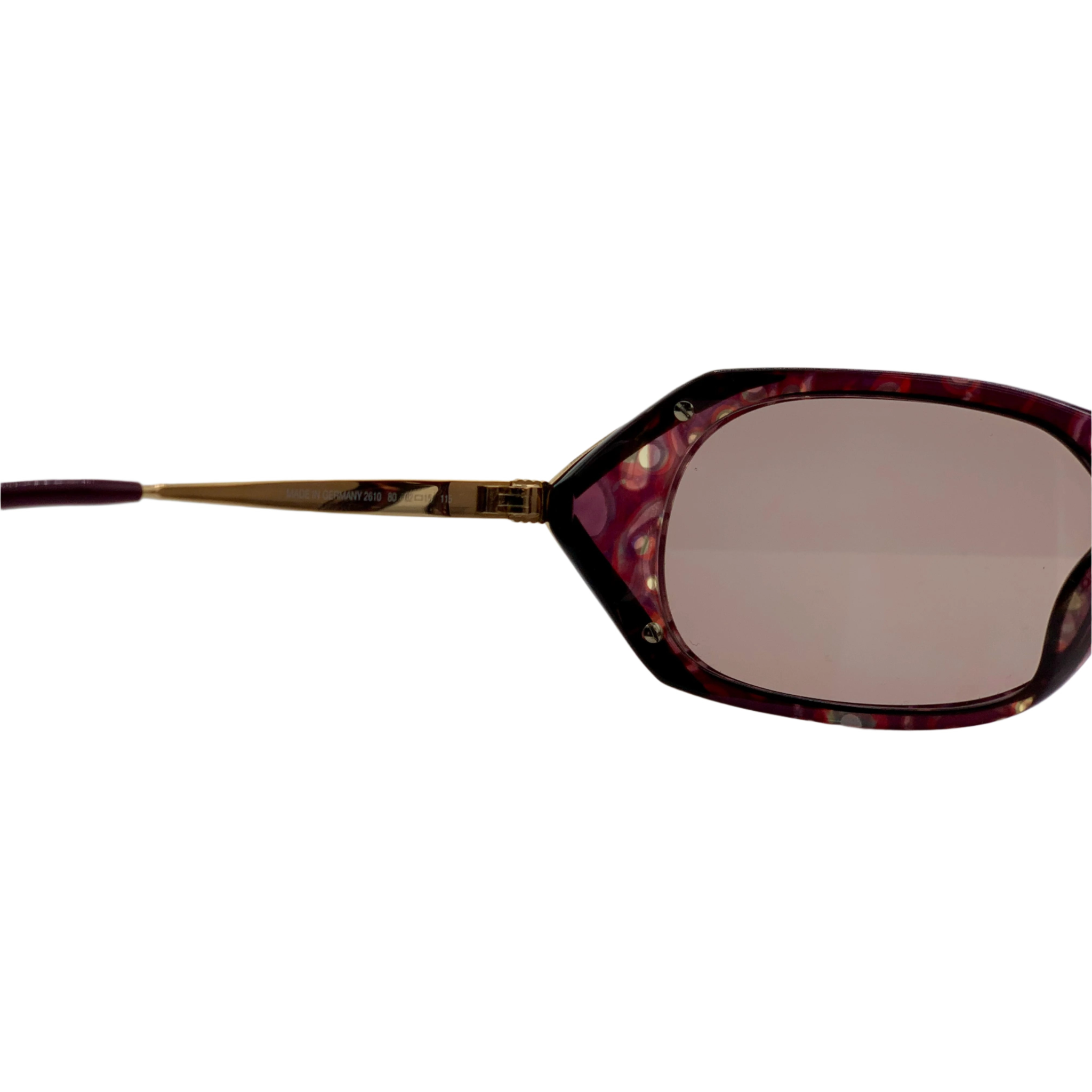 Side view of vintage Christian Dior Oval 2610 80 sunglasses in pink and gold frame