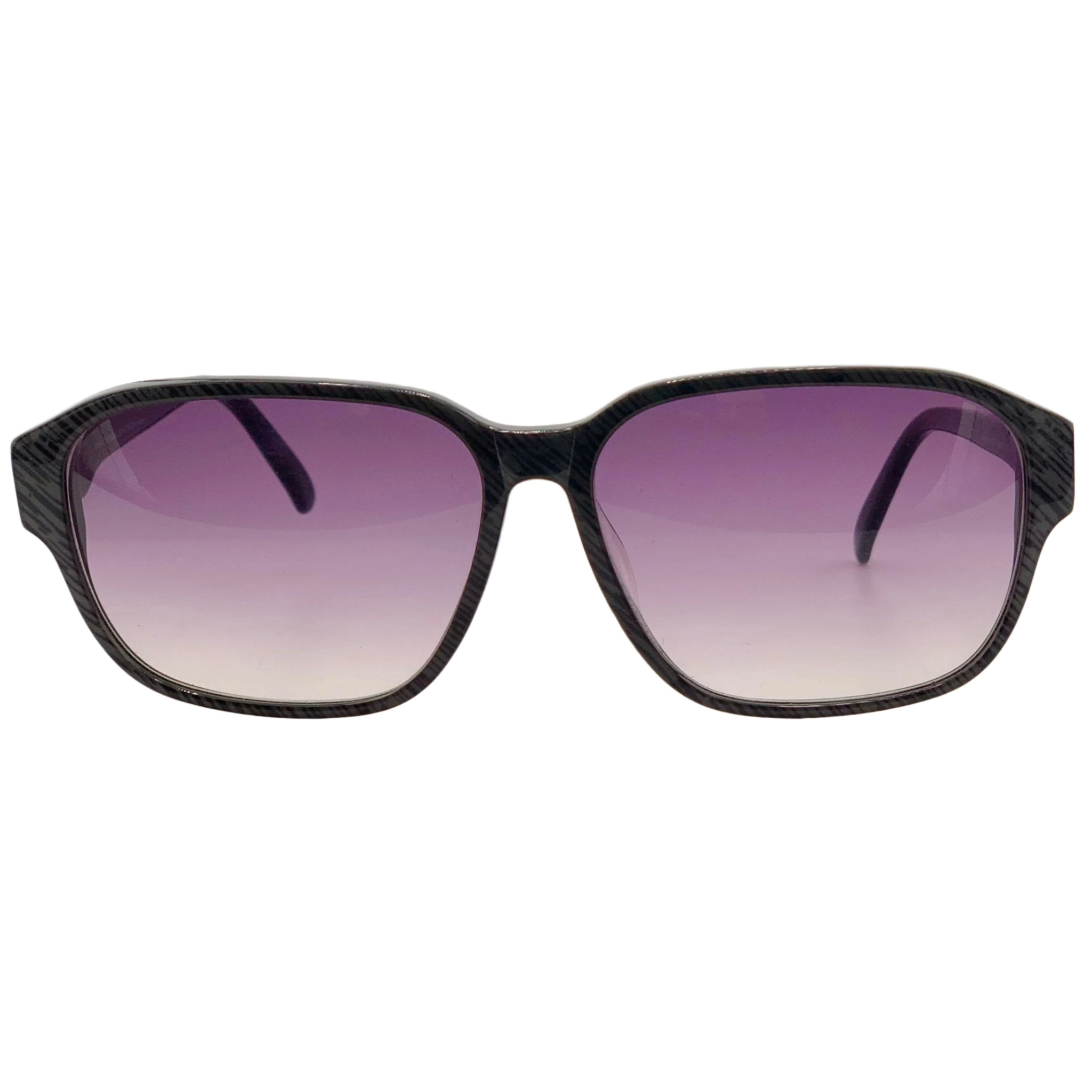 Black round sunglasses with oversized frame and gold detailing by Balenciaga