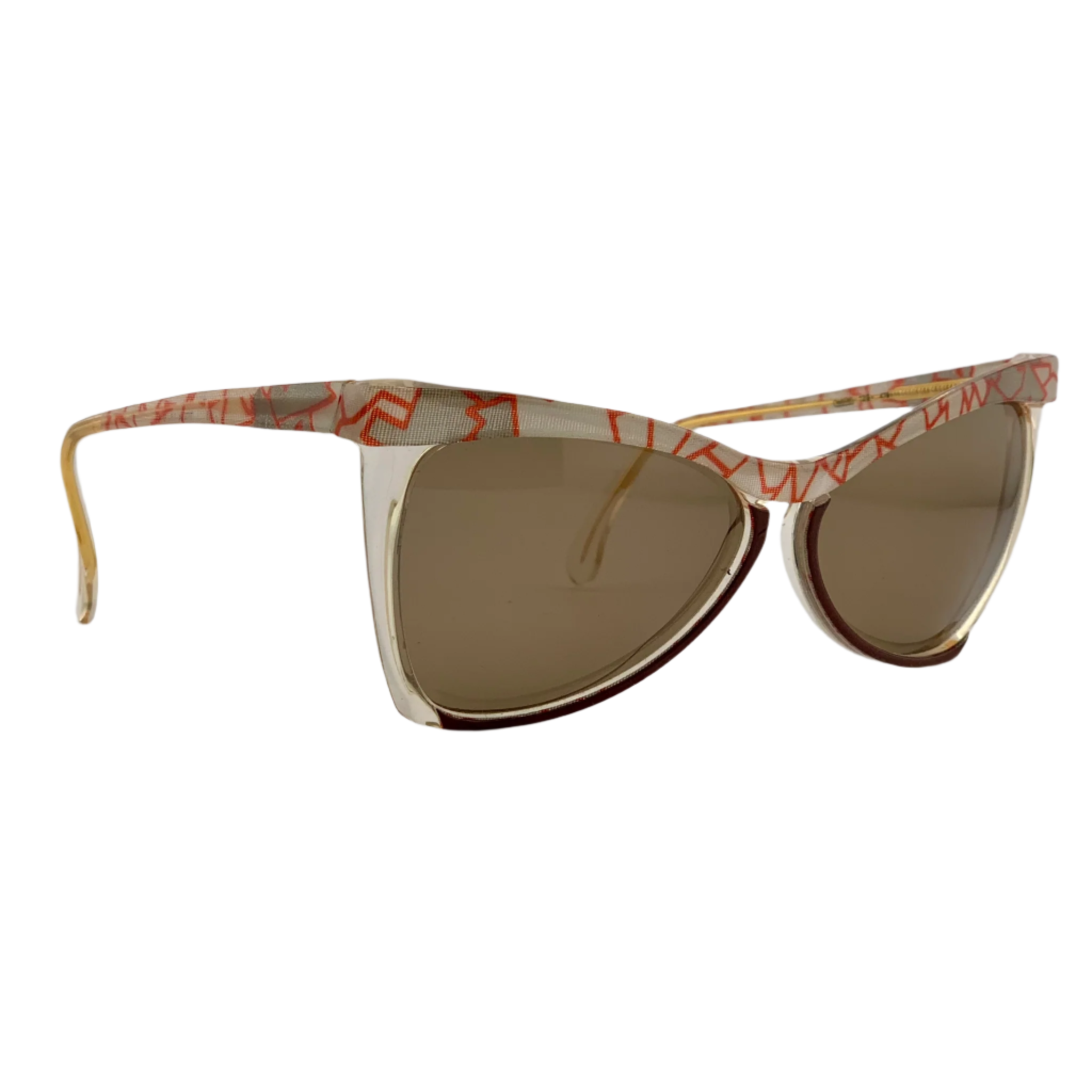 Beige, orange, and black frame with brown lenses