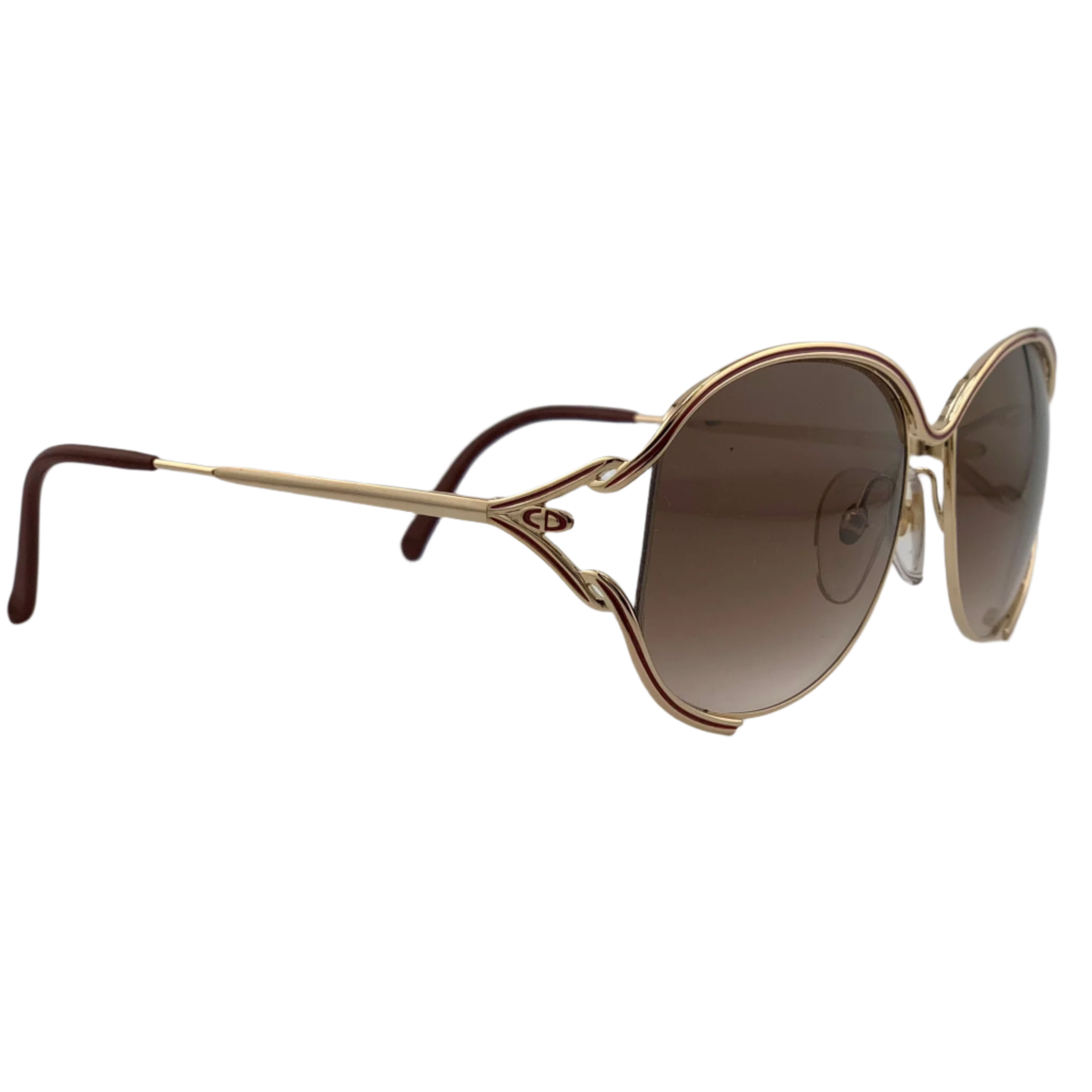 Unworn and authentic Christian Dior Oval sunglasses featuring a sophisticated gold and red frame with brown lenses
