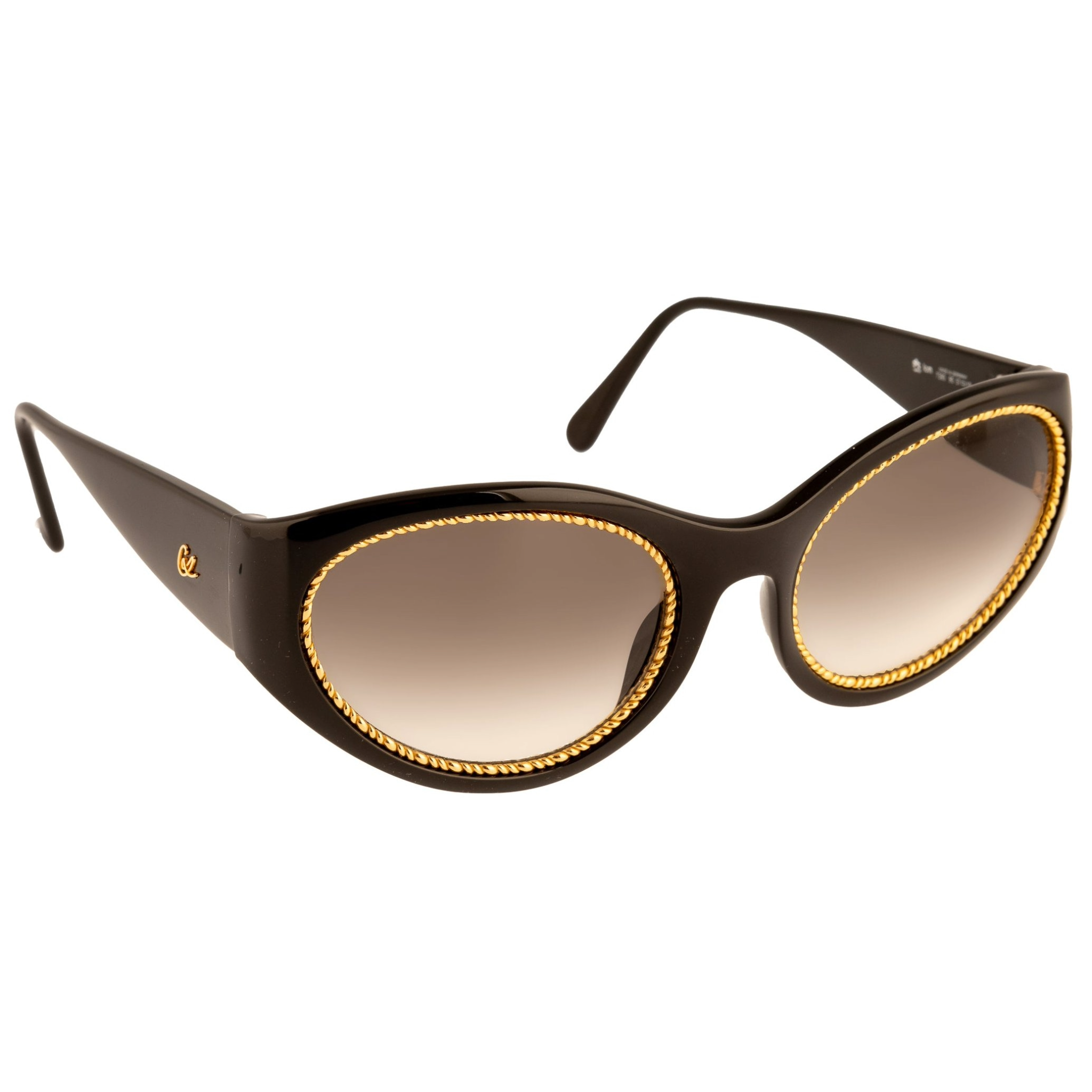 Authentic vintage Christian Lacroix Cat Eye 7390 90 sunglasses for women in black and gold frame with brown lenses, never worn or sold